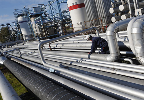 Man working on industrial plant