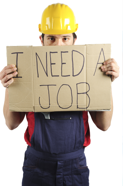 Man holding I need a job sign