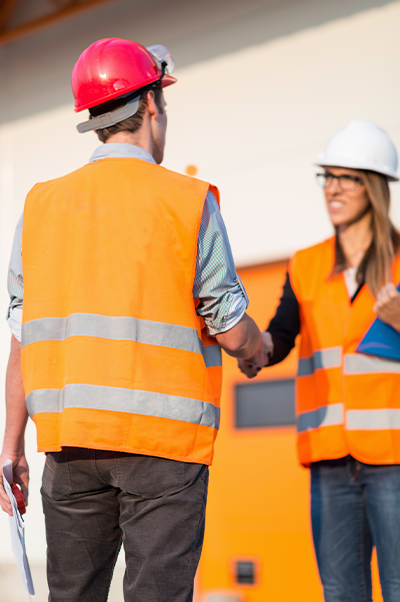 Hand shake at commercial construction site