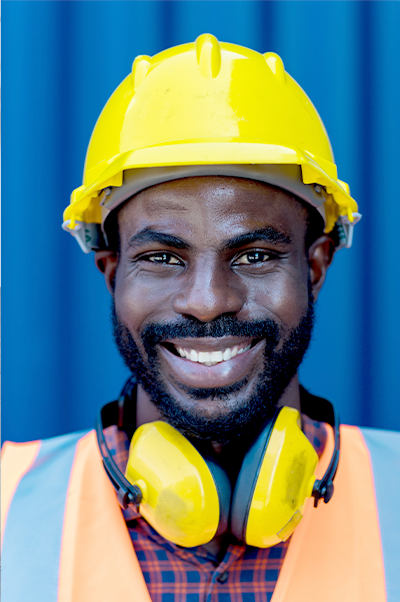 Black construction worker smiling